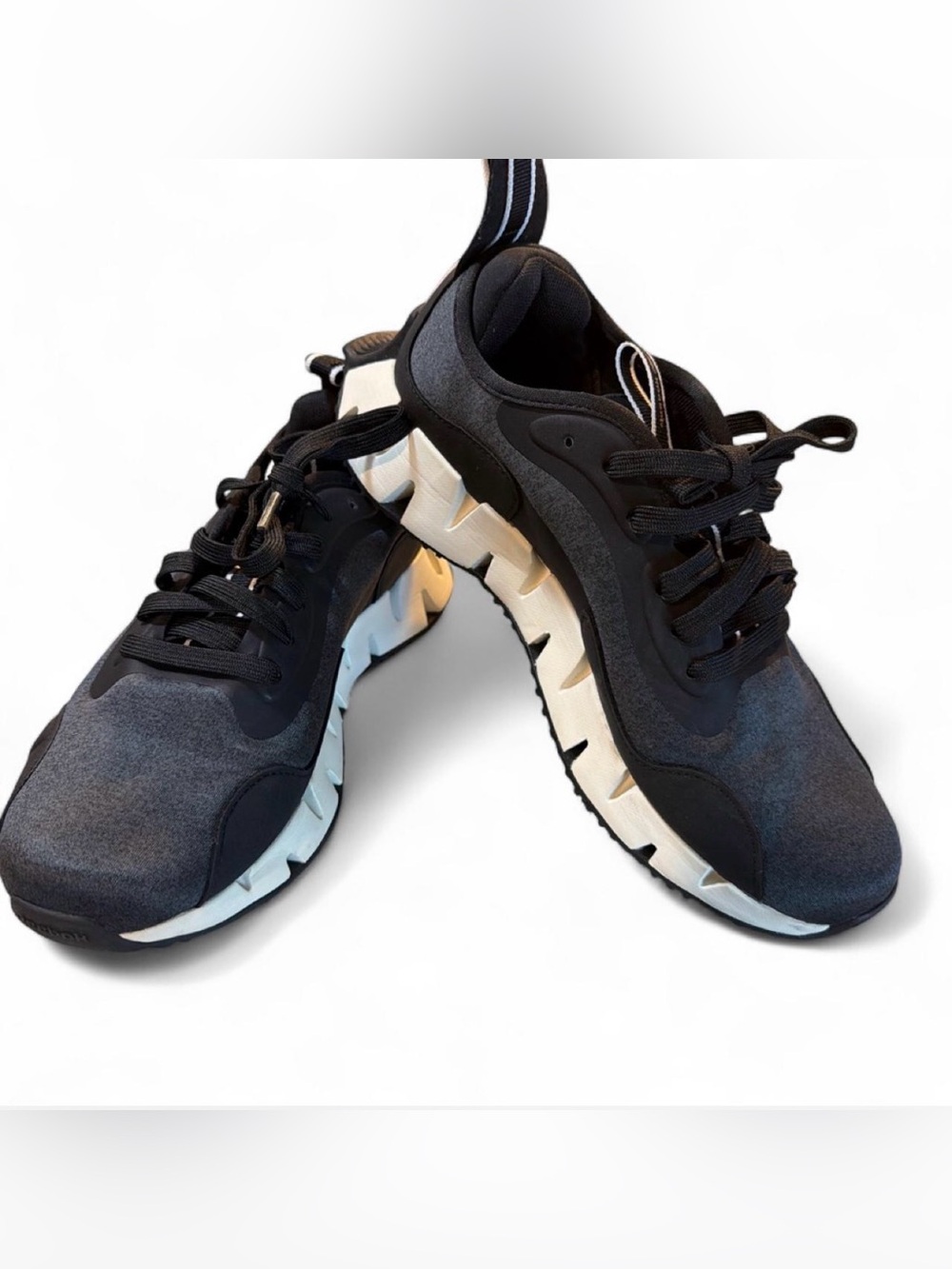 Reebok woman’s  Black Athletic Sneakers with White Sole